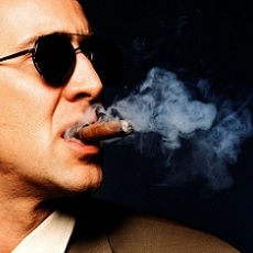 Can I smoke inside restaurants or bars in Riga?